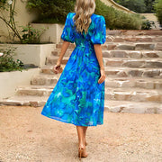 Maxine - Feminines Blumenkleid mit Puffärmeln